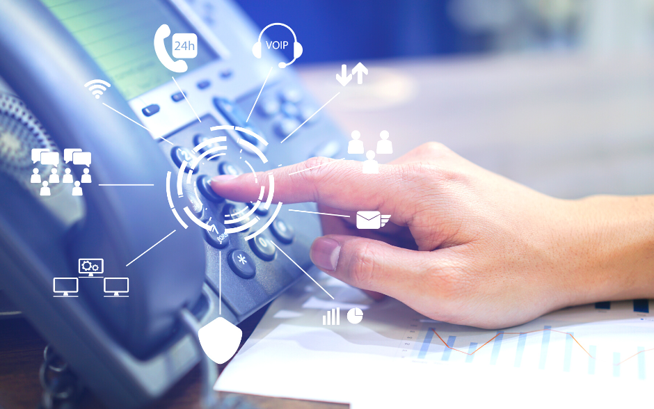 Hand operating a VOIP phone with 2d pictures coming out of the phone button where the person clicks explaining different VOIP options.